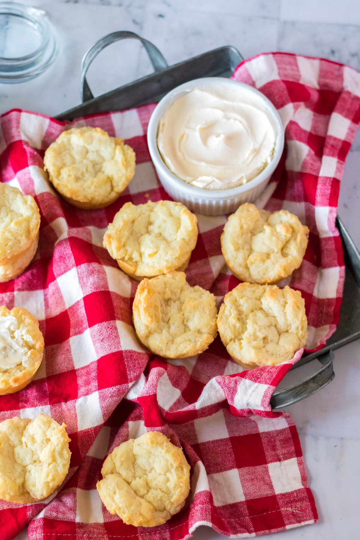 table full of sour cream biscuits