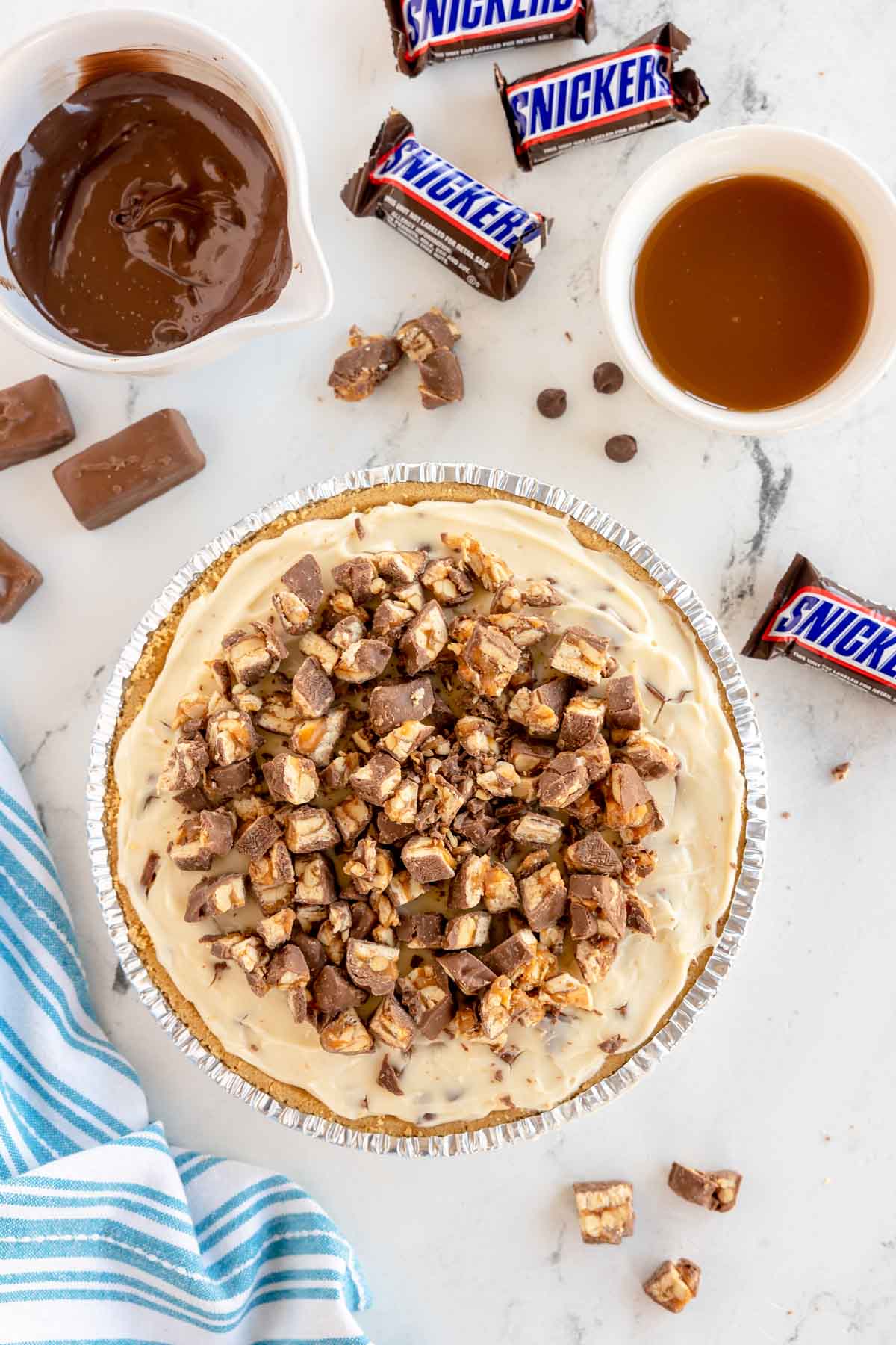snickers pie topped chunks of snickers bars