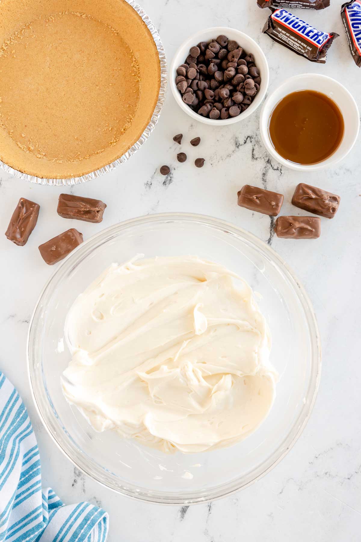 Add the sour cream and vanilla to the cream cheese mixture and mix well