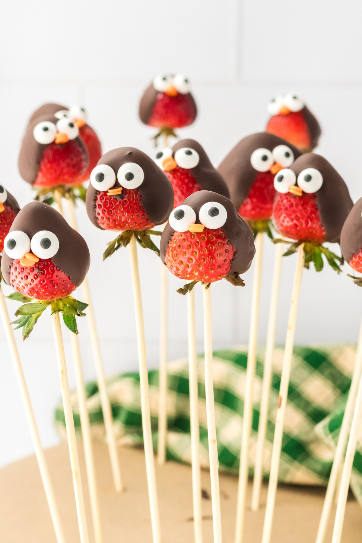 chocolate covered strawberry penguins on sticks