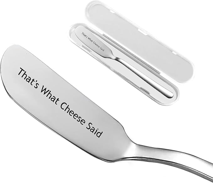 flat butter knife with pun engraved on it