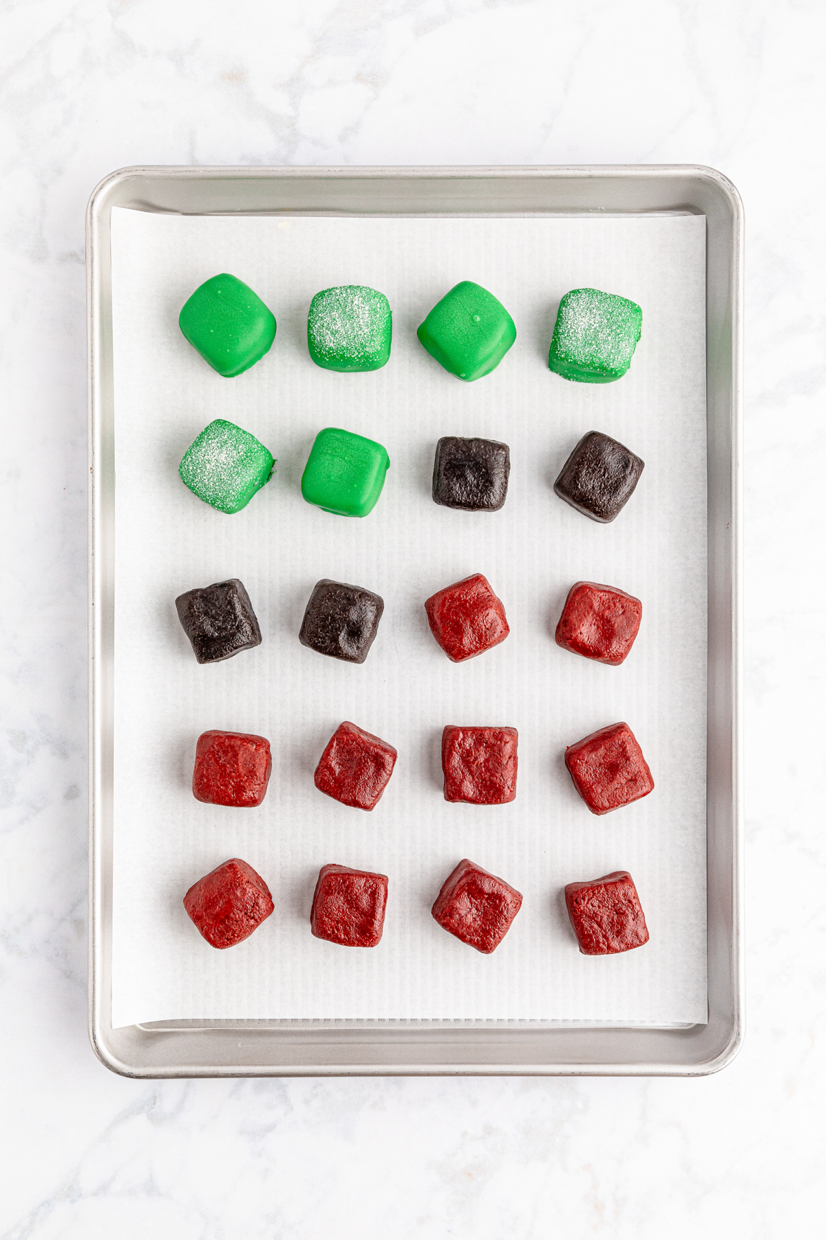 chocolate covered Christmas Oreo balls in a square shape
