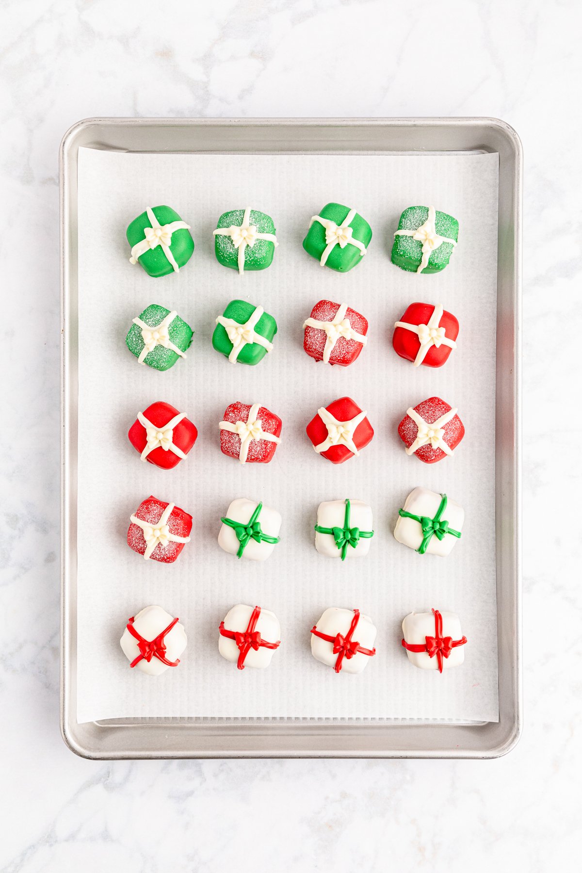 Christmas Oreo presents on a baking sheet