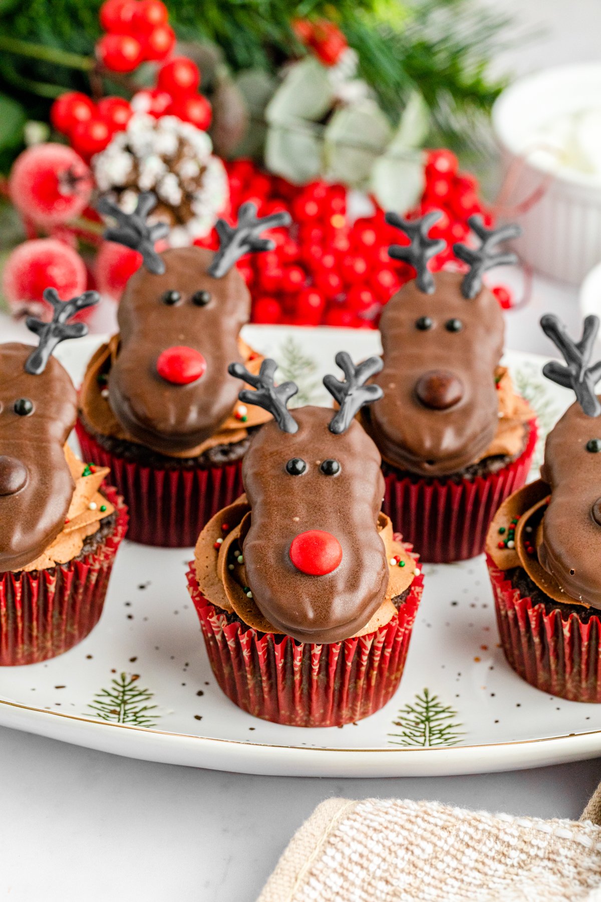 reindeer cupcakes on a white plate