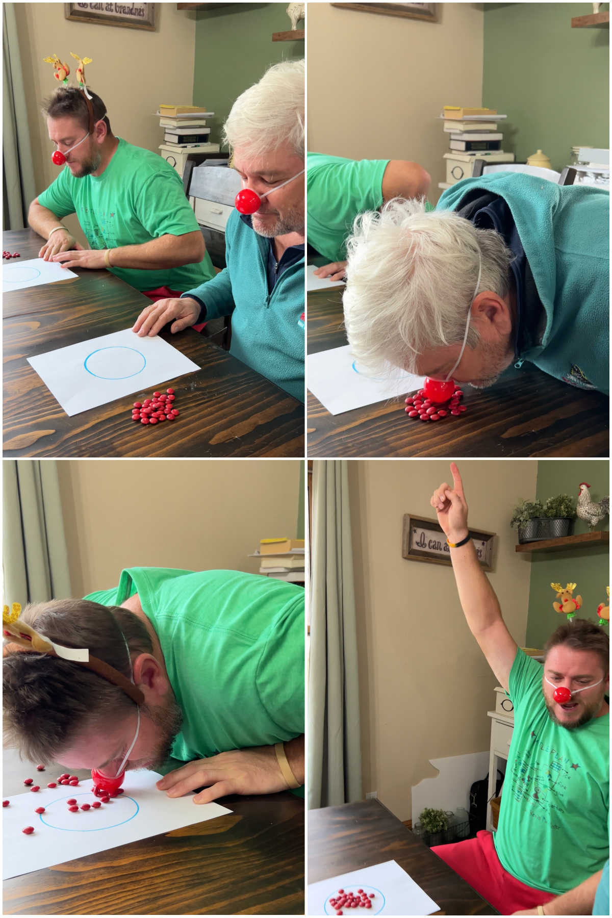 two men moving red M&Ms with their noses