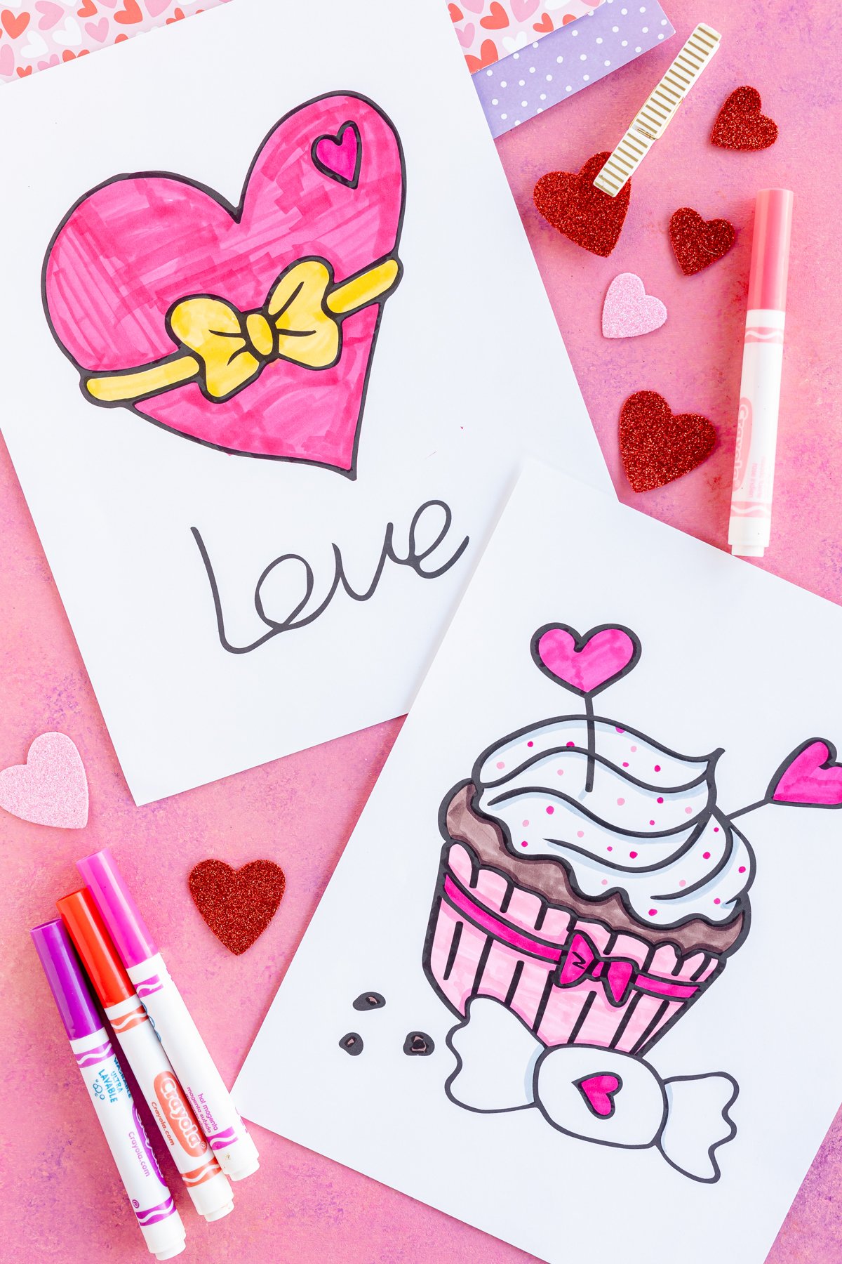 filled in coloring sheet with heart and cupcake design