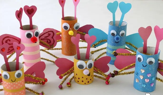 toilet paper rolls with various bug decorations