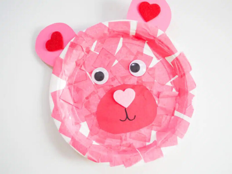 paper plate with pink paper that looks like a heart