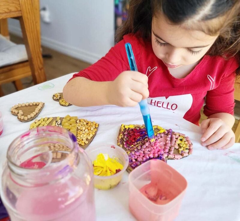 dried pasta glued to heart and painted