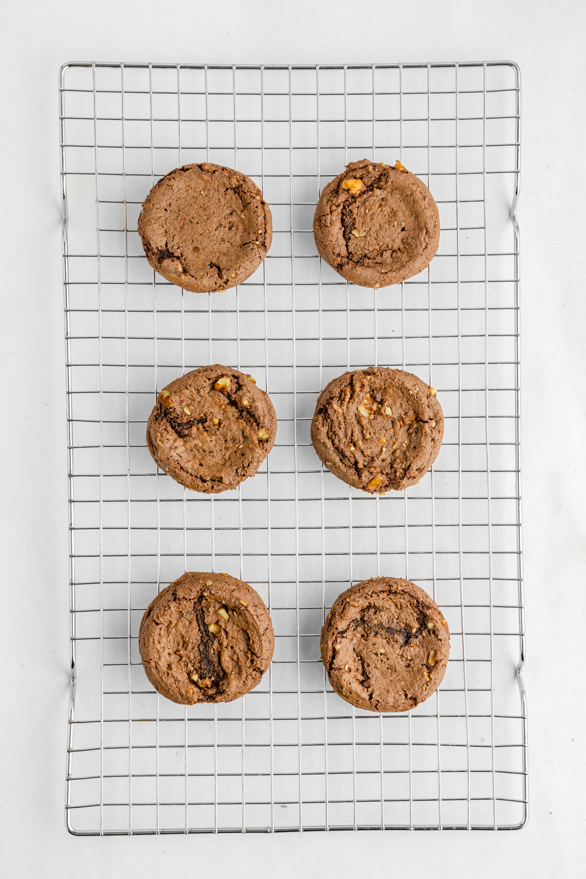 baked chocolate cookies on a cooling rack