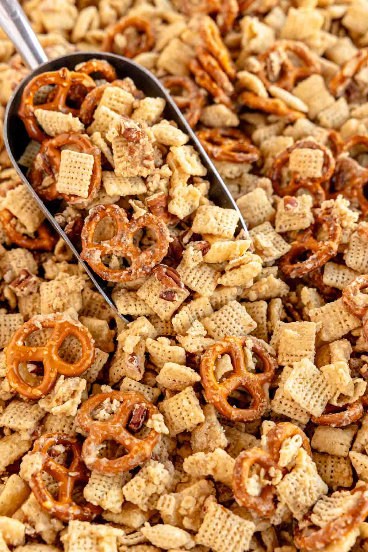 baking sheet with a scoop of sweet chex mix