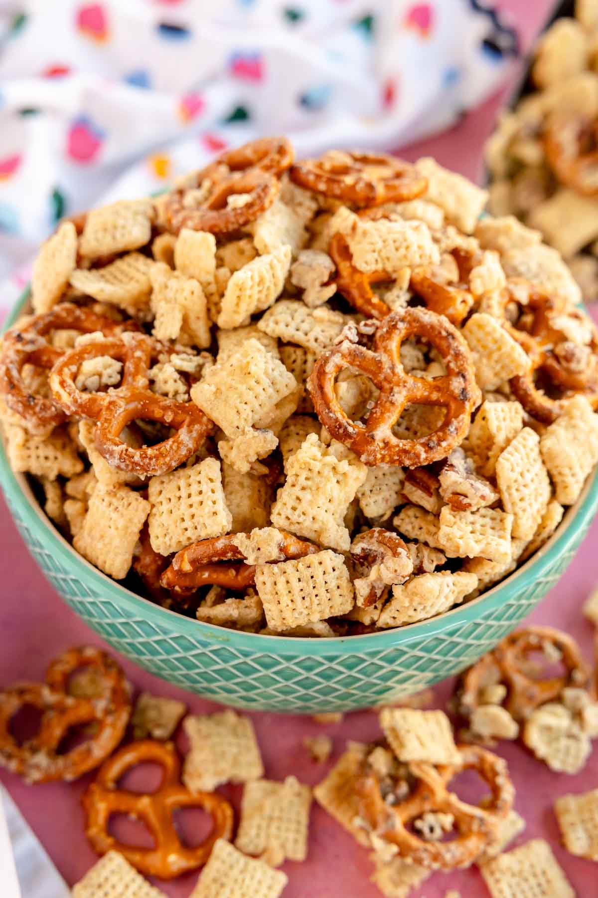 blue bowl full of sweet chex mix