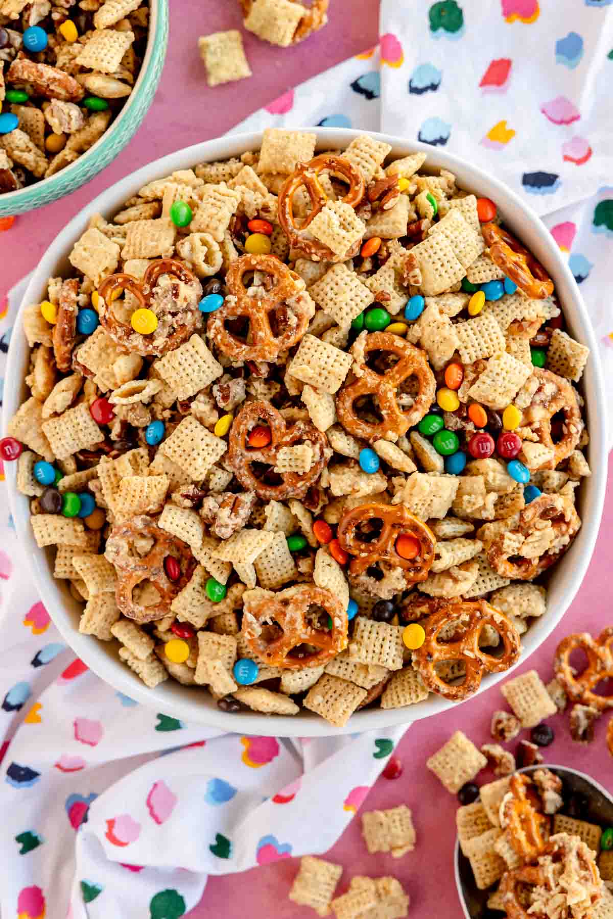 white bowl with sweet chex mix with mini M&Ms
