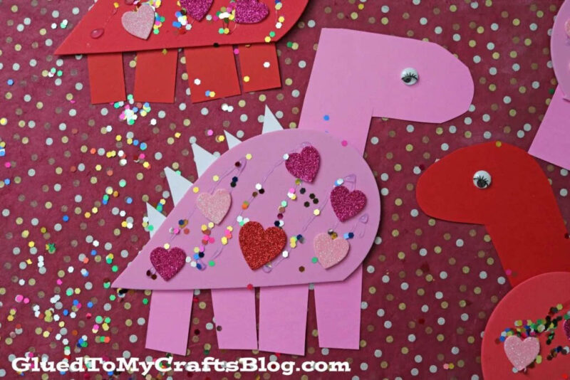 cut out dinosaur decorated with variety of valentines shaped