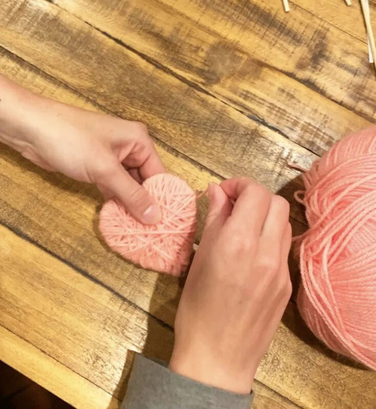heart shaped cut out wrapped in yarn