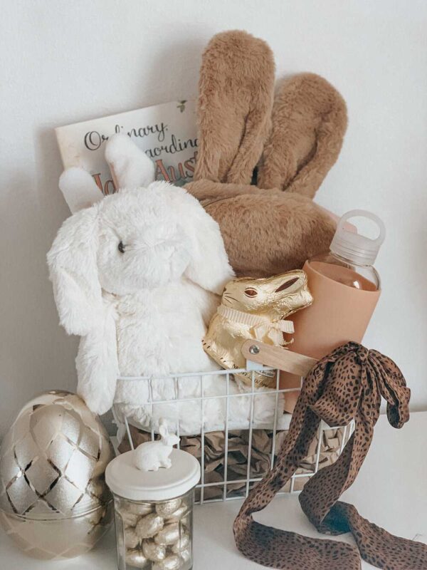 easter basket filled with a variety of bunny toys