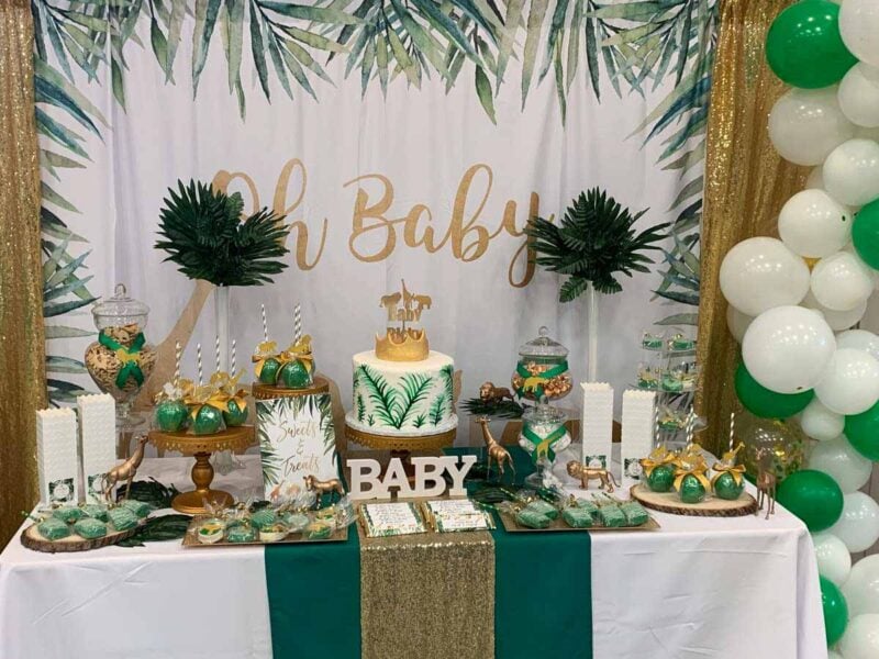 green table setting with safari decorated food and plates