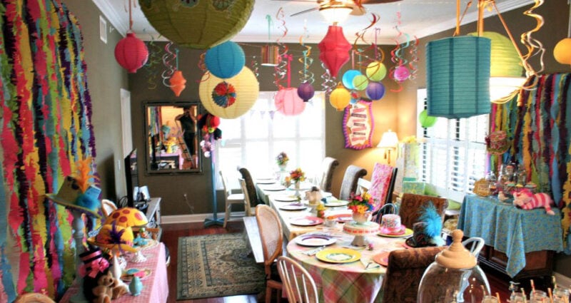 whimsical and brightly decorated room with alice in wonderland accents