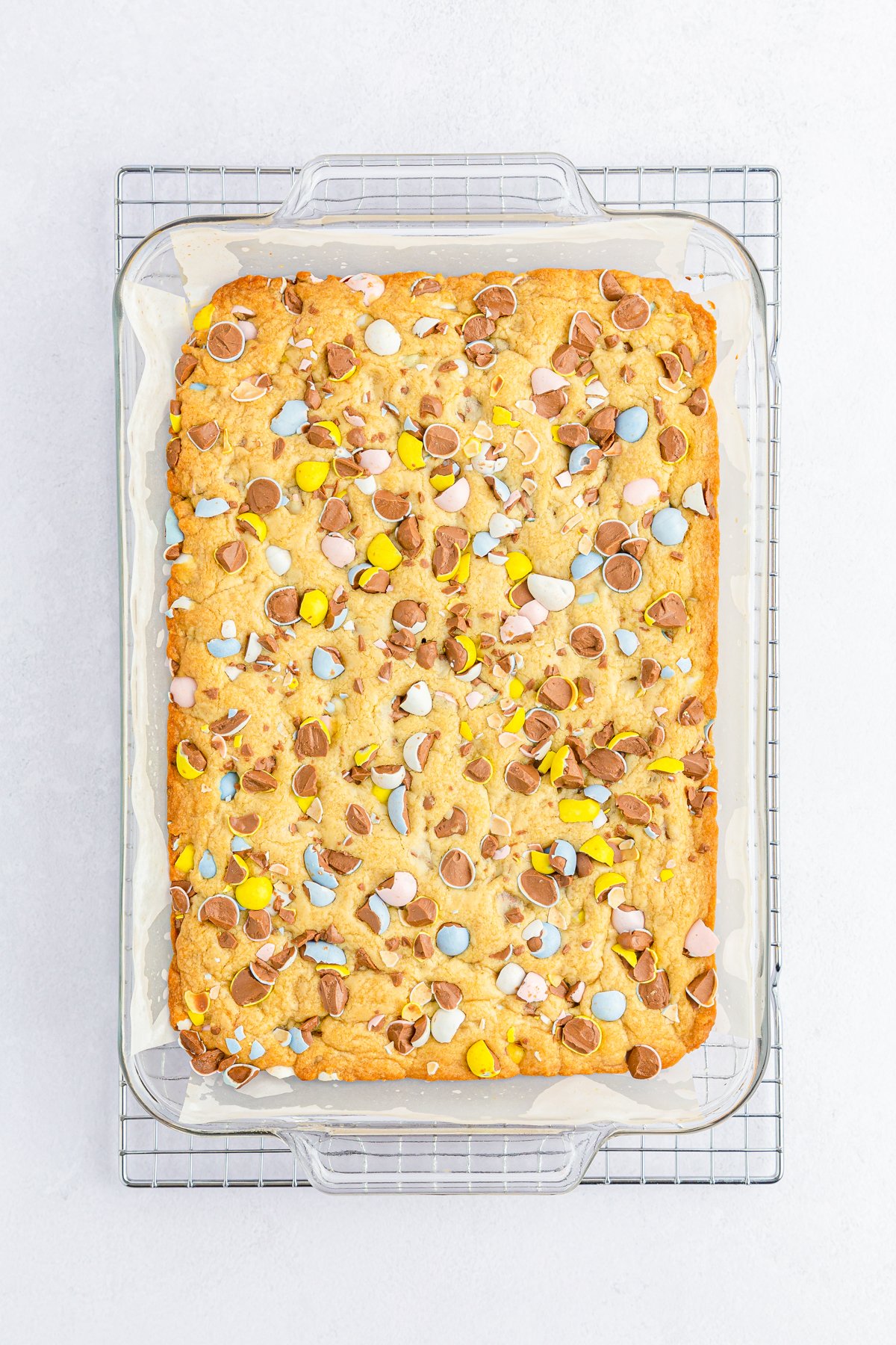 baked mini egg cookie bars in a pan