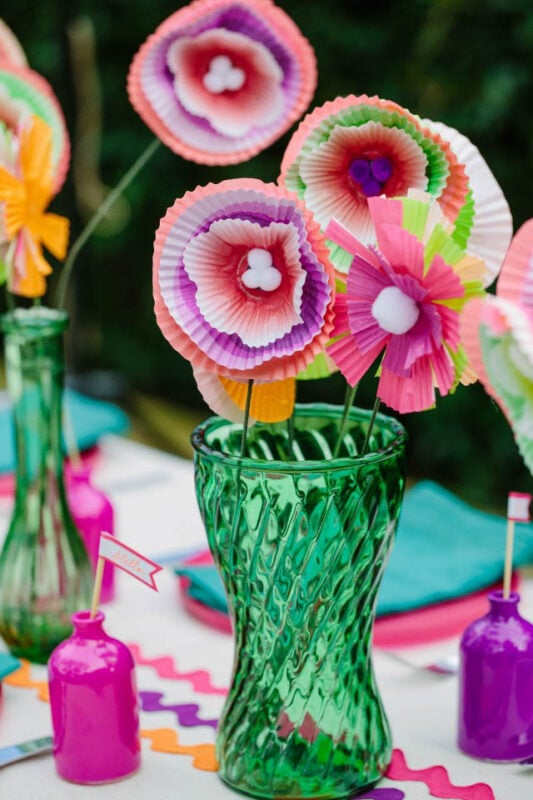 multicolored paper flowers in a vase