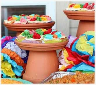 clay planters turned upside down and used as a cake stand