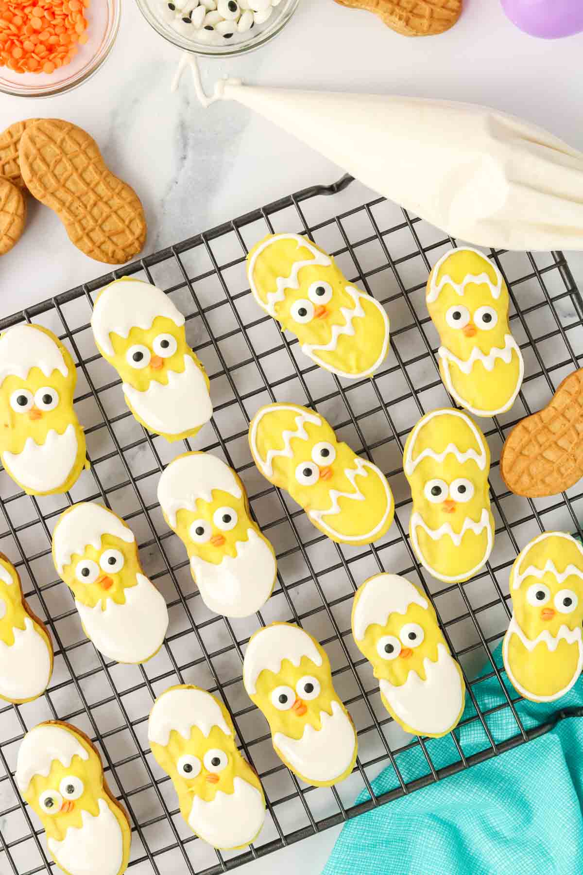 Nutter Butter chicks on a cooling rack with egg shells