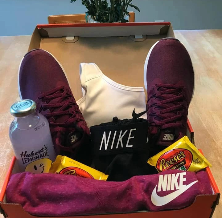 shoe box used as an easter basket with new shoes and workout gear