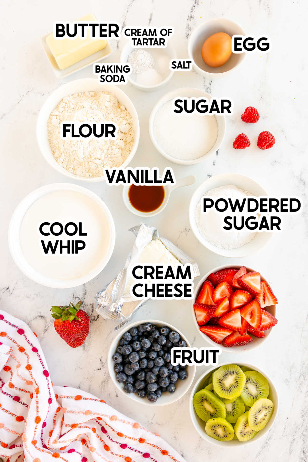 ingredients in sugar cookie fruit pizza with labels