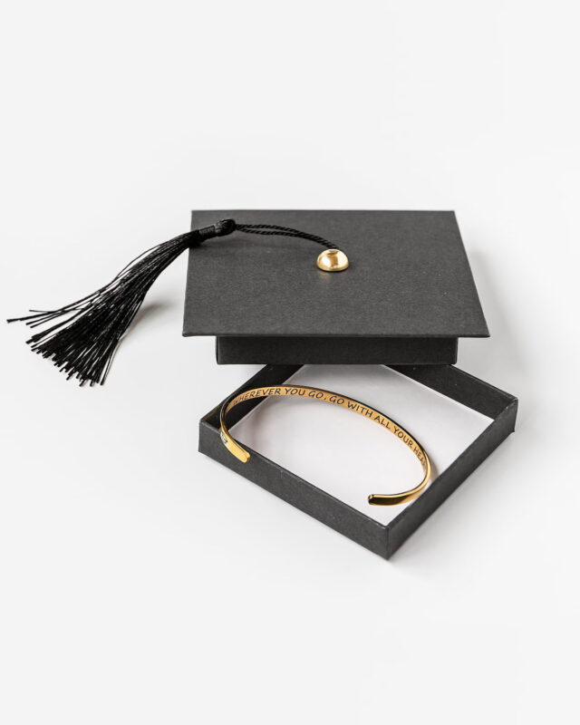 black box with tassel top and golden personalized bracelet inside