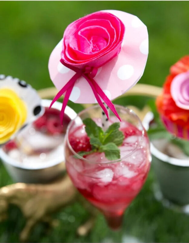 pink paper hat stirrer in a drink
