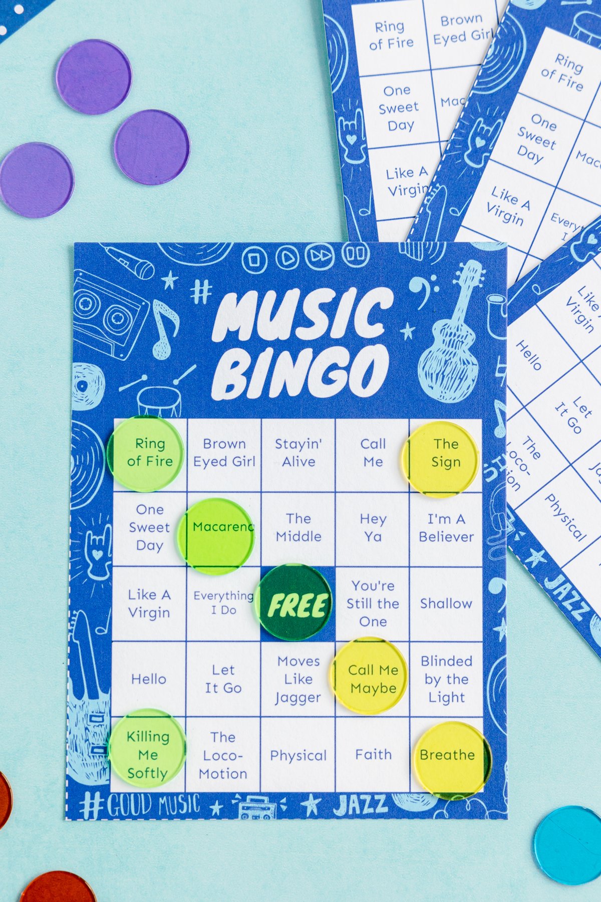 blue music bingo card with bingo markers across it