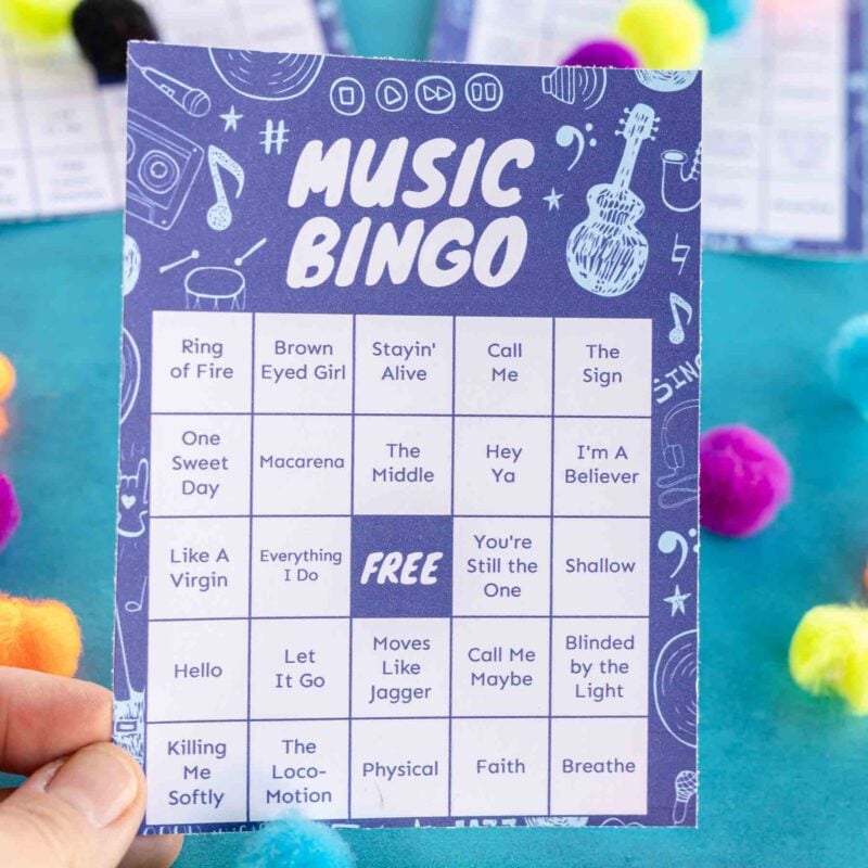 hand holding a music bingo card