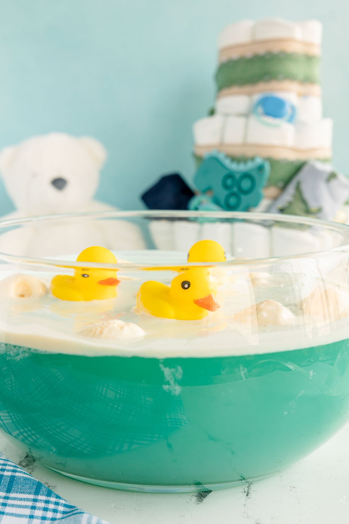 punch bowl with blue punch and rubber duckies