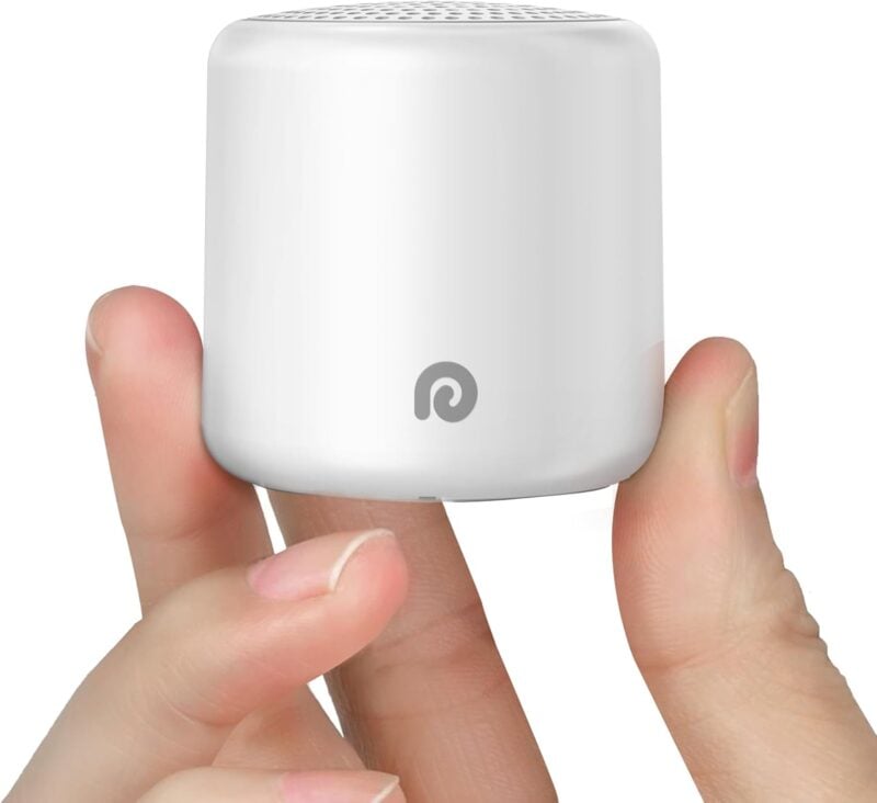 white noise machine in someone's hand