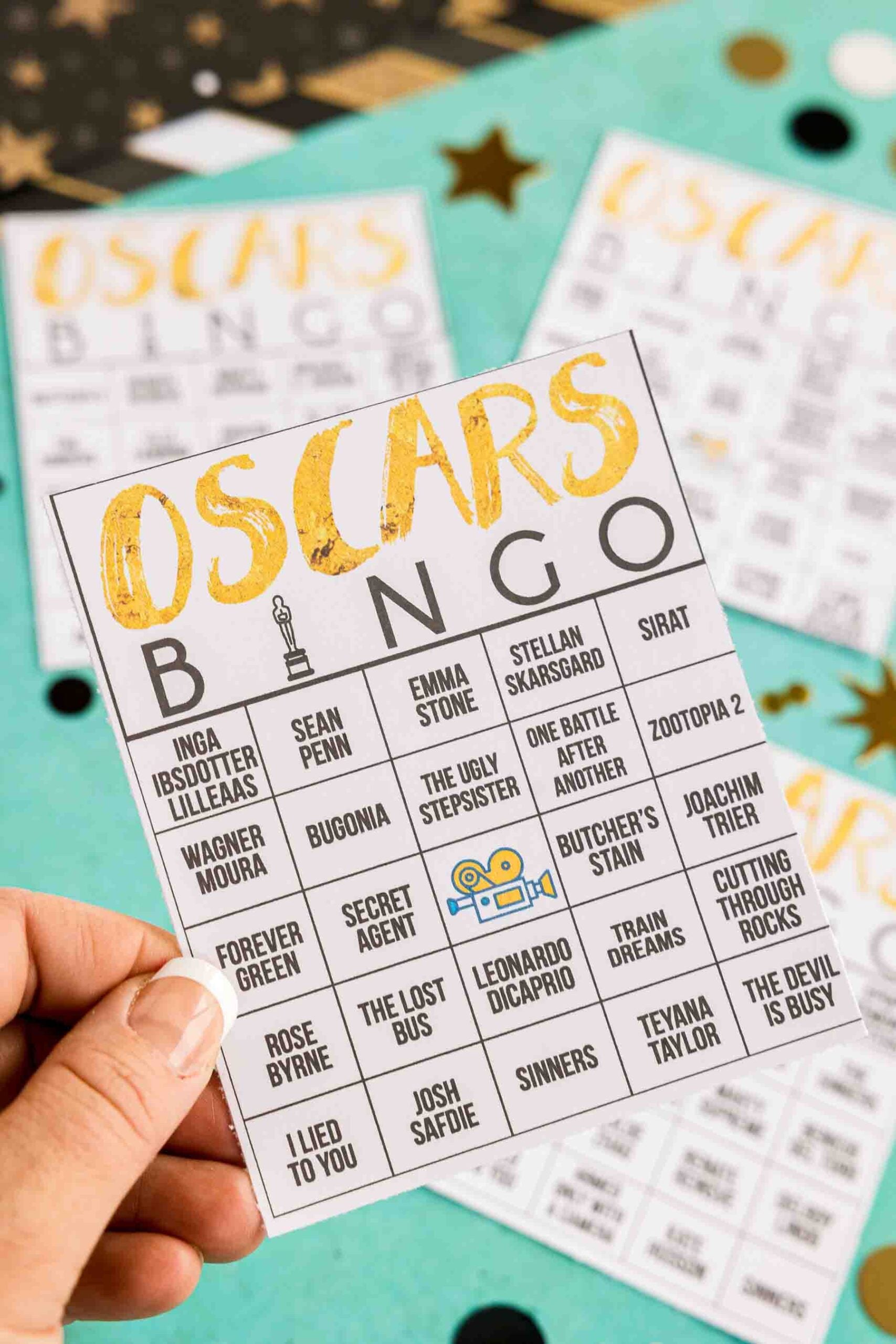 hand holding an Oscar bingo card