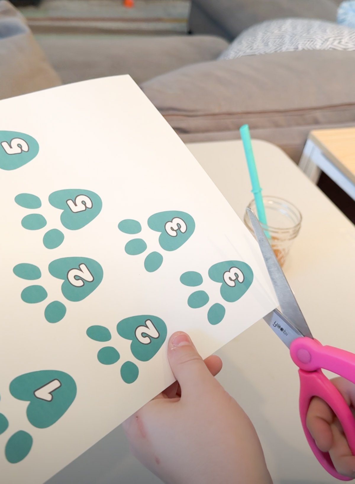 pink scissors cutting out printable bunny tracks 