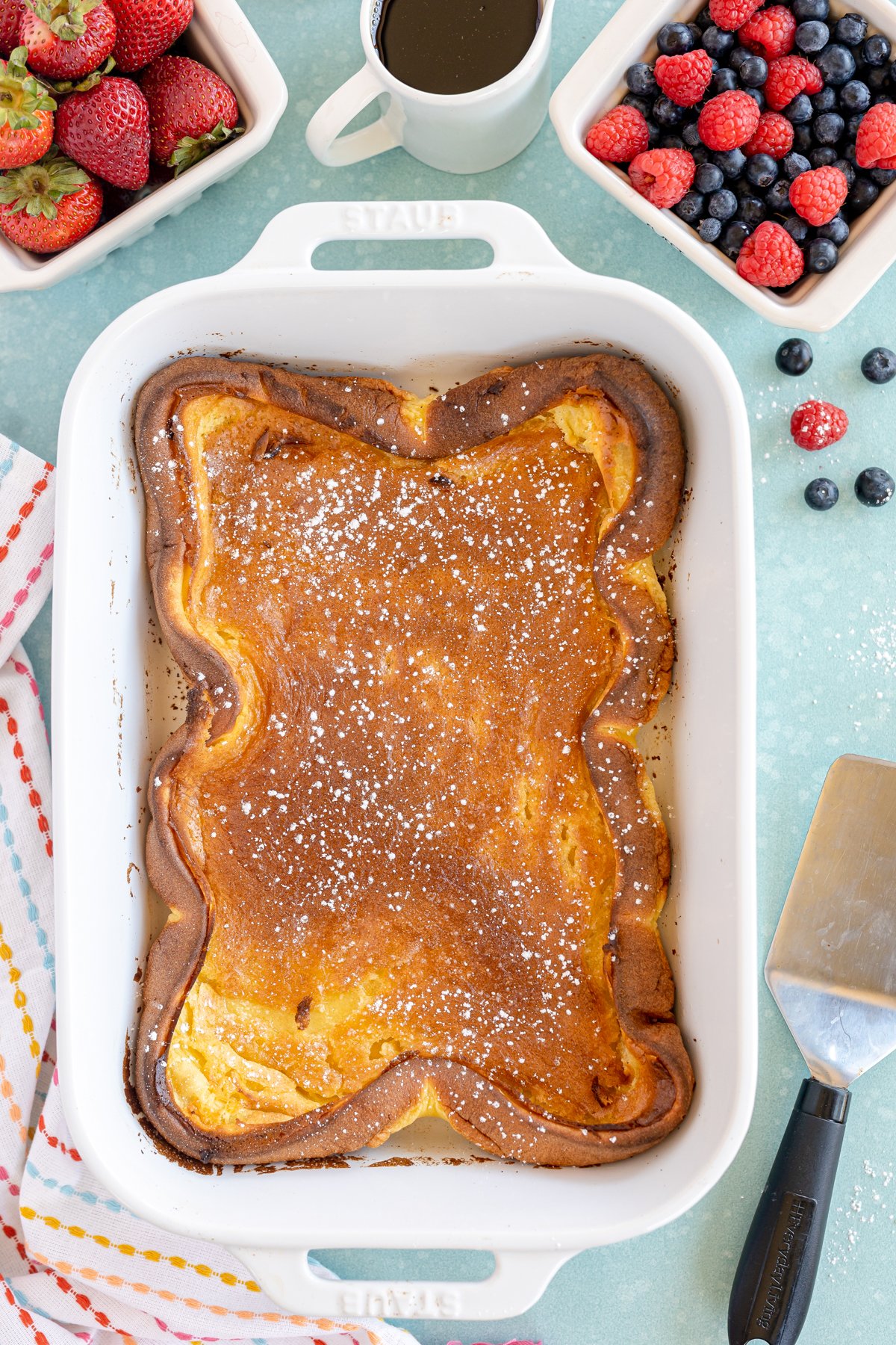 baked German pancakes in a white baking dish