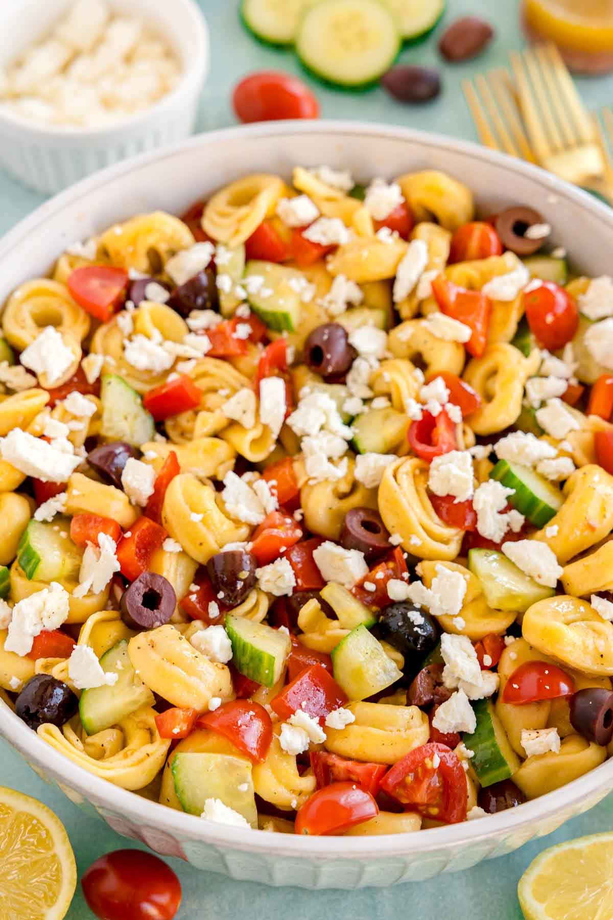 white bowl of greek tortellini pasta salad