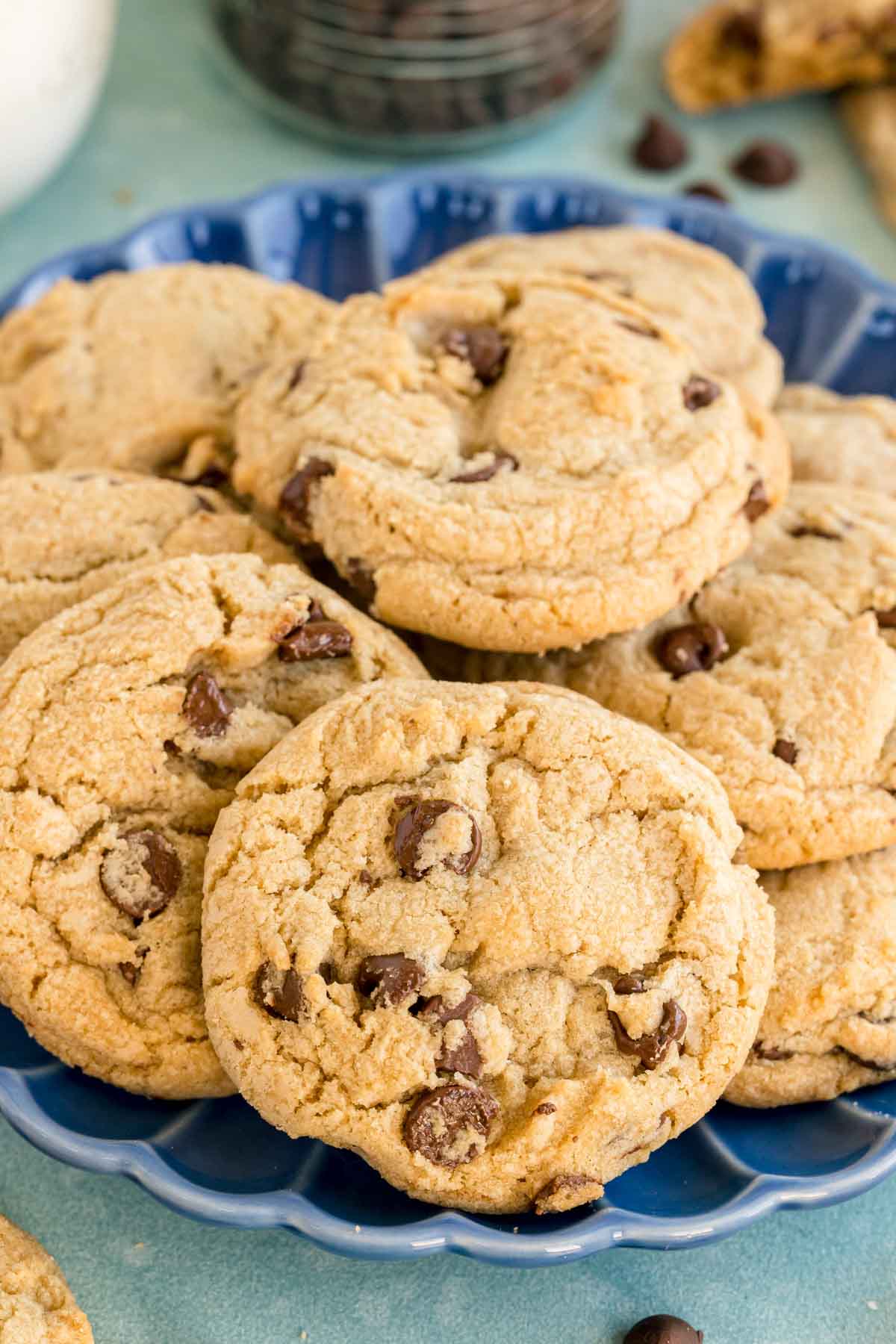 pile of chocolate chip cookies on a blue plate