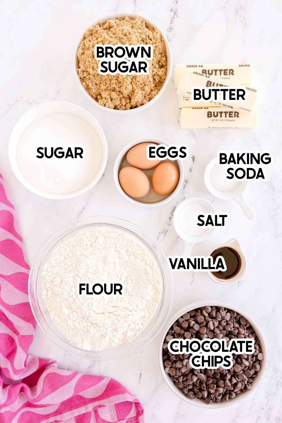 ingredients needed to make large batch chocolate chip cookies with labels
