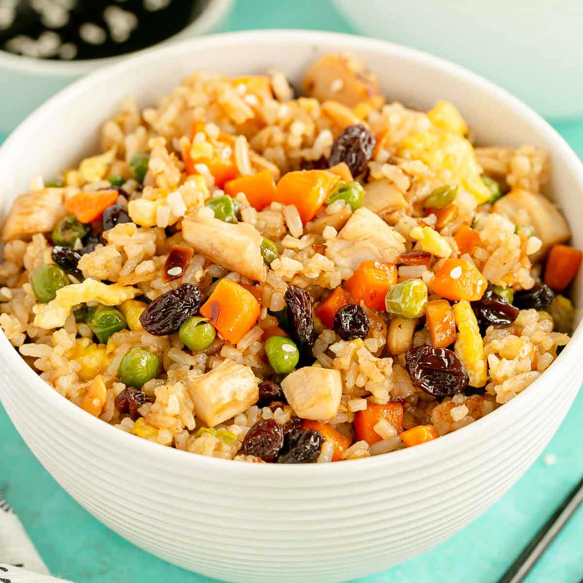 white bowl of rotisserie chicken fried rice