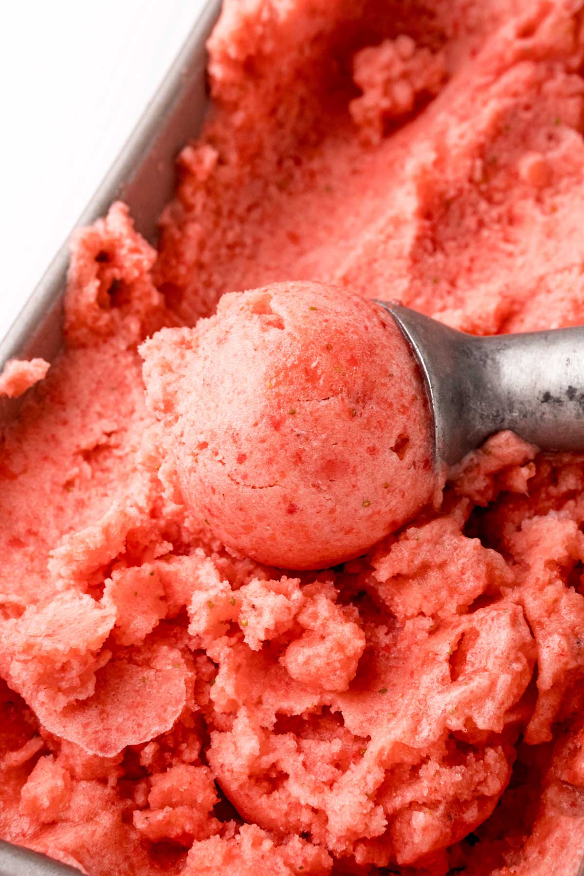 strawberry lemon sorbet in a metal cake pan