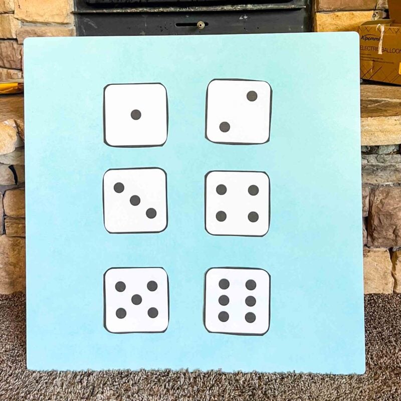 blue board with dice outline on it