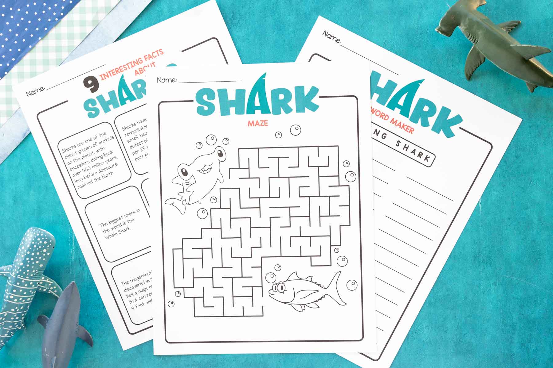 three blank printable shark activities stacked on top of each other