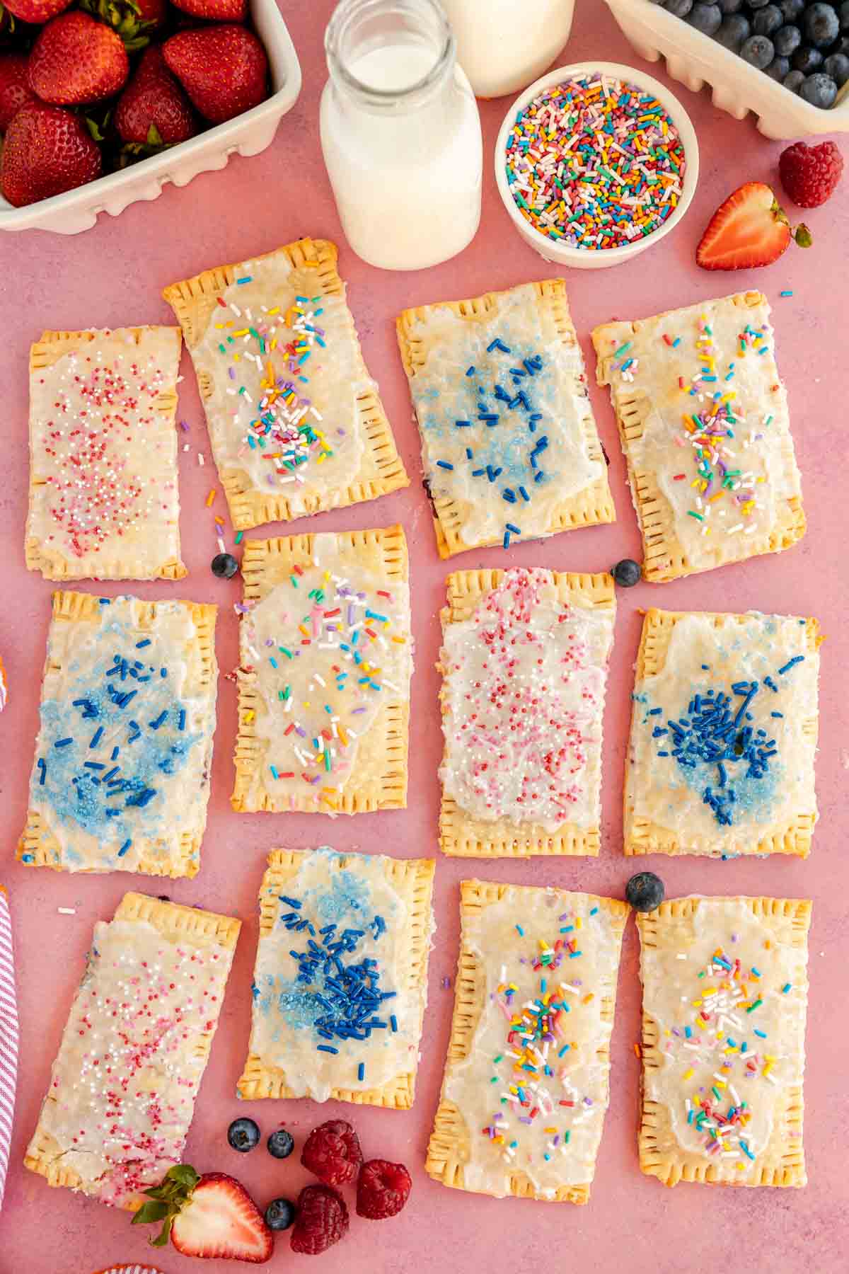 various homemade pop tarts on a pink background
