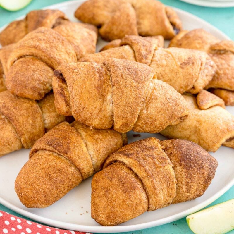 white plate with apple turnovers using crescent rolls