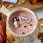 mug with a candle inside with mushrooms