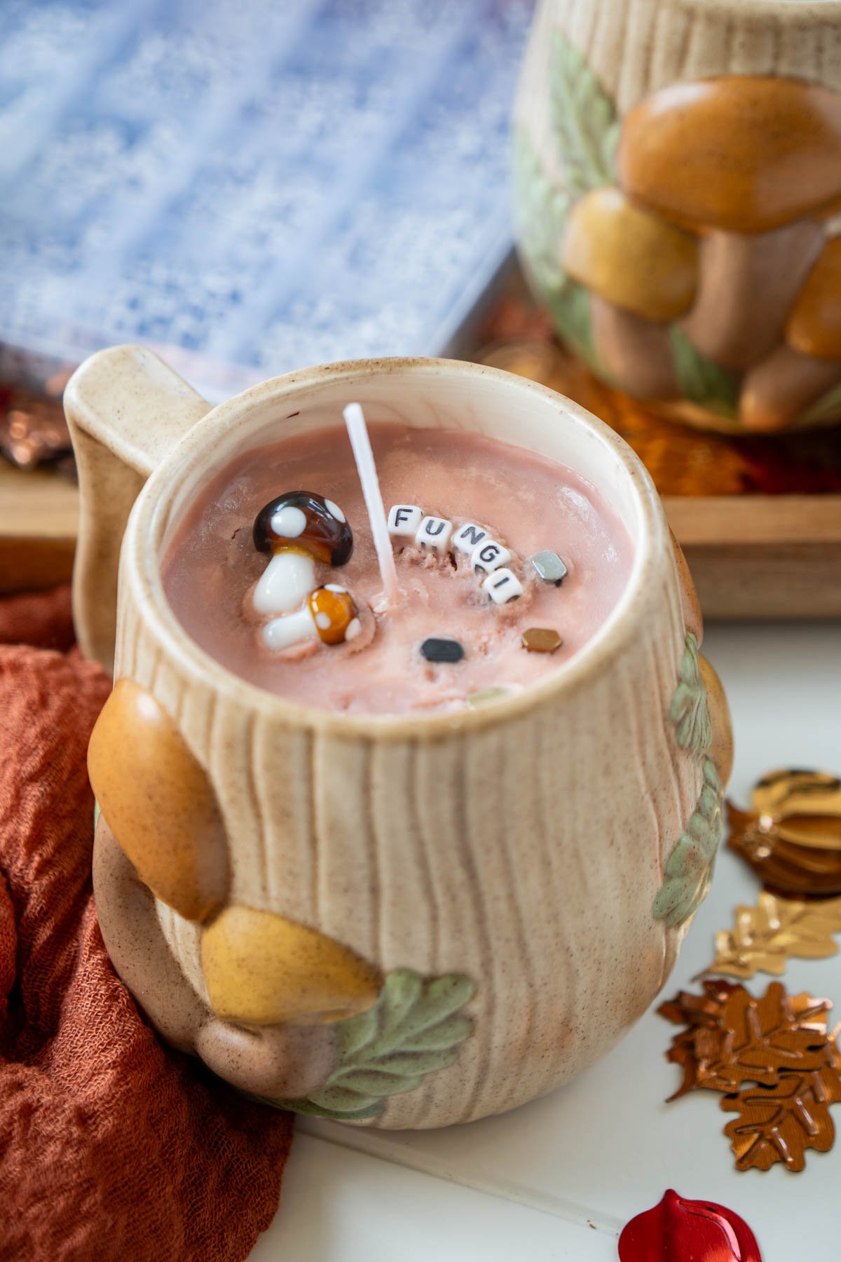 mug candle on a white table