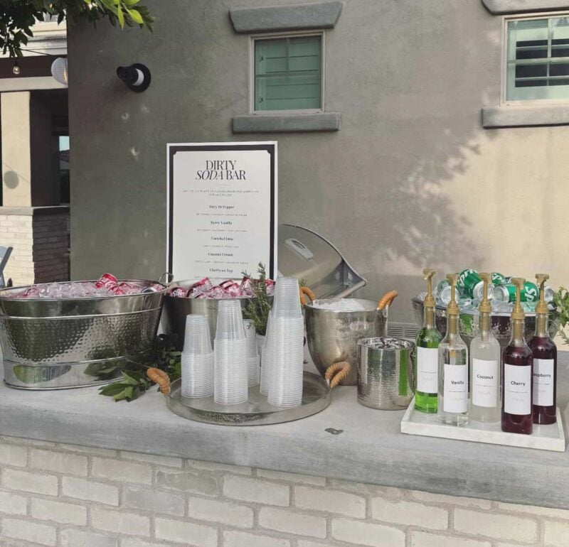 various drinks and coolers for a dirty soda bar