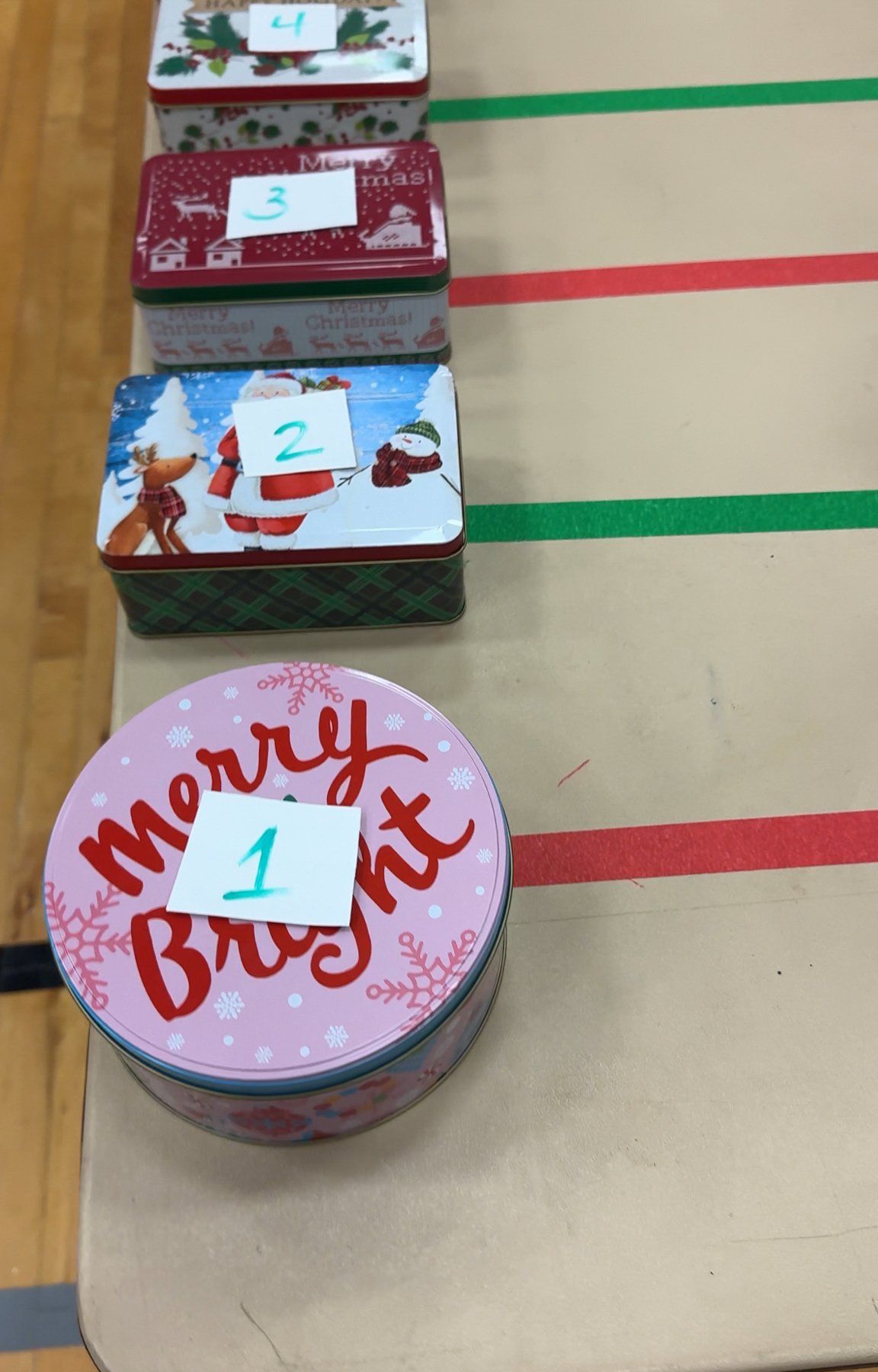 gift boxes with numbers and tape on a table